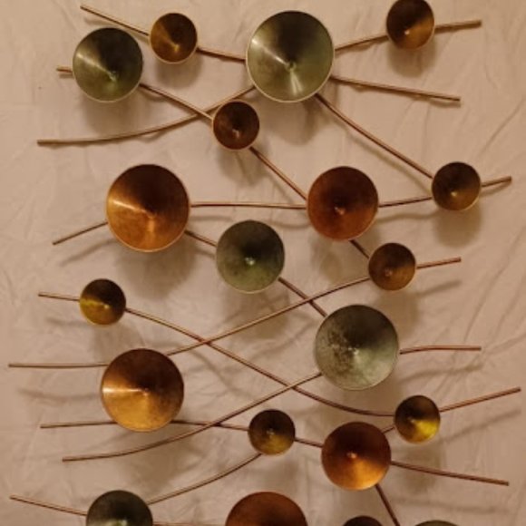 circle metal wall art 50in by 32 1/2in